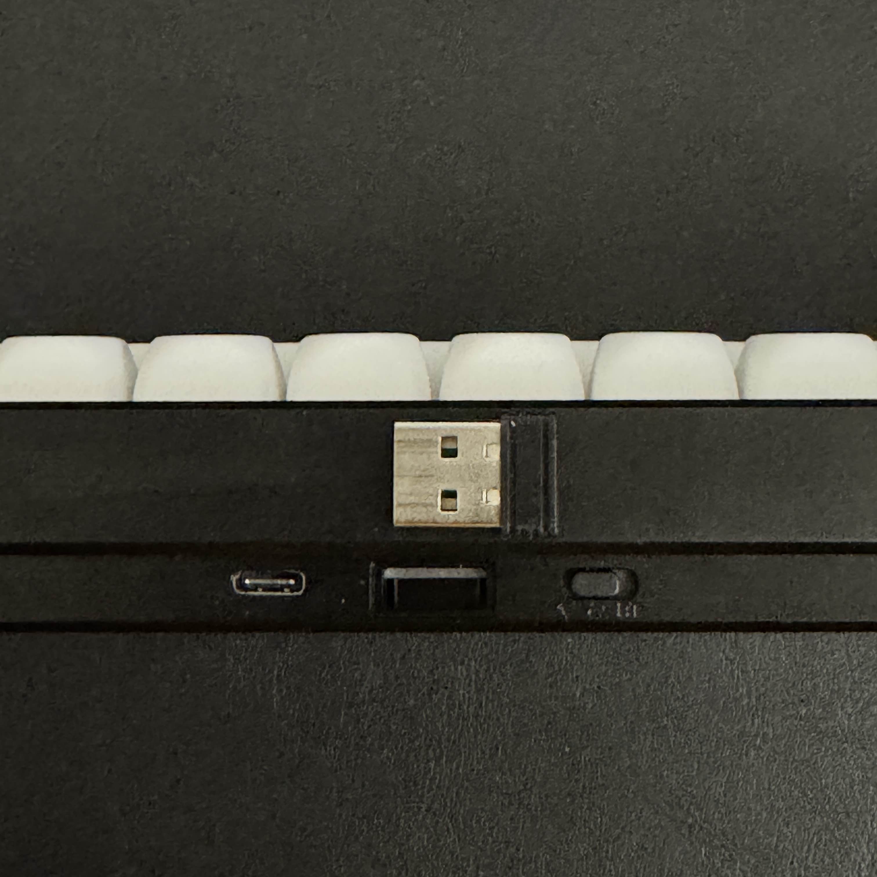 It has a really nice 2.4gHz dongle magnetic holder on the backside of the keyboard's case, which I just found to be a really nice small detail.