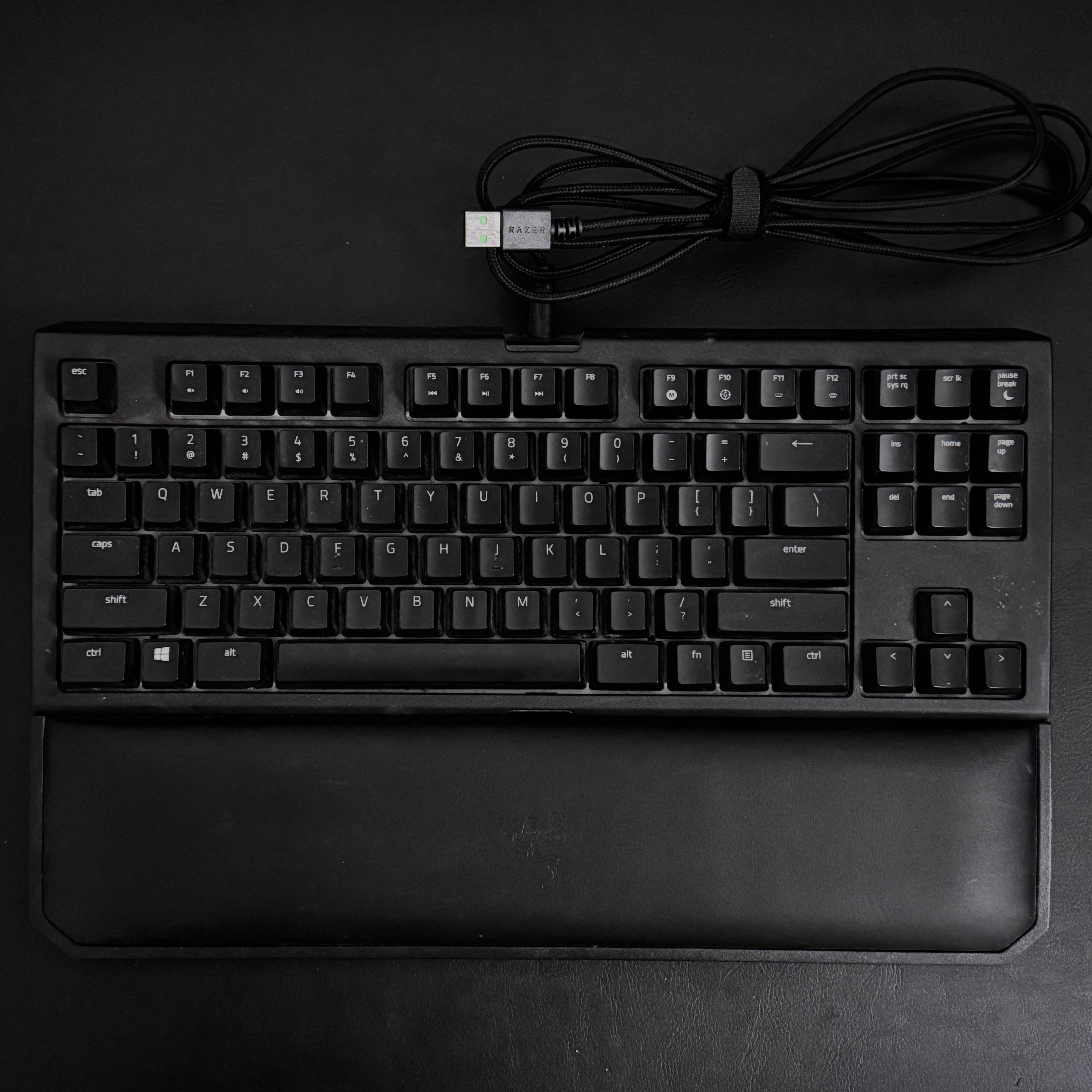 The keyboard came with this wrist rest that I was really impressed by. It attaches to the keyboard magnetically which helps prevent it from sliding around, along with the help of the rubber feet on the bottom. Unfortunately, it always covered up the LED logo which I always hated&mdash;it felt like I had to give up the fun light for a slight increase in comfort.