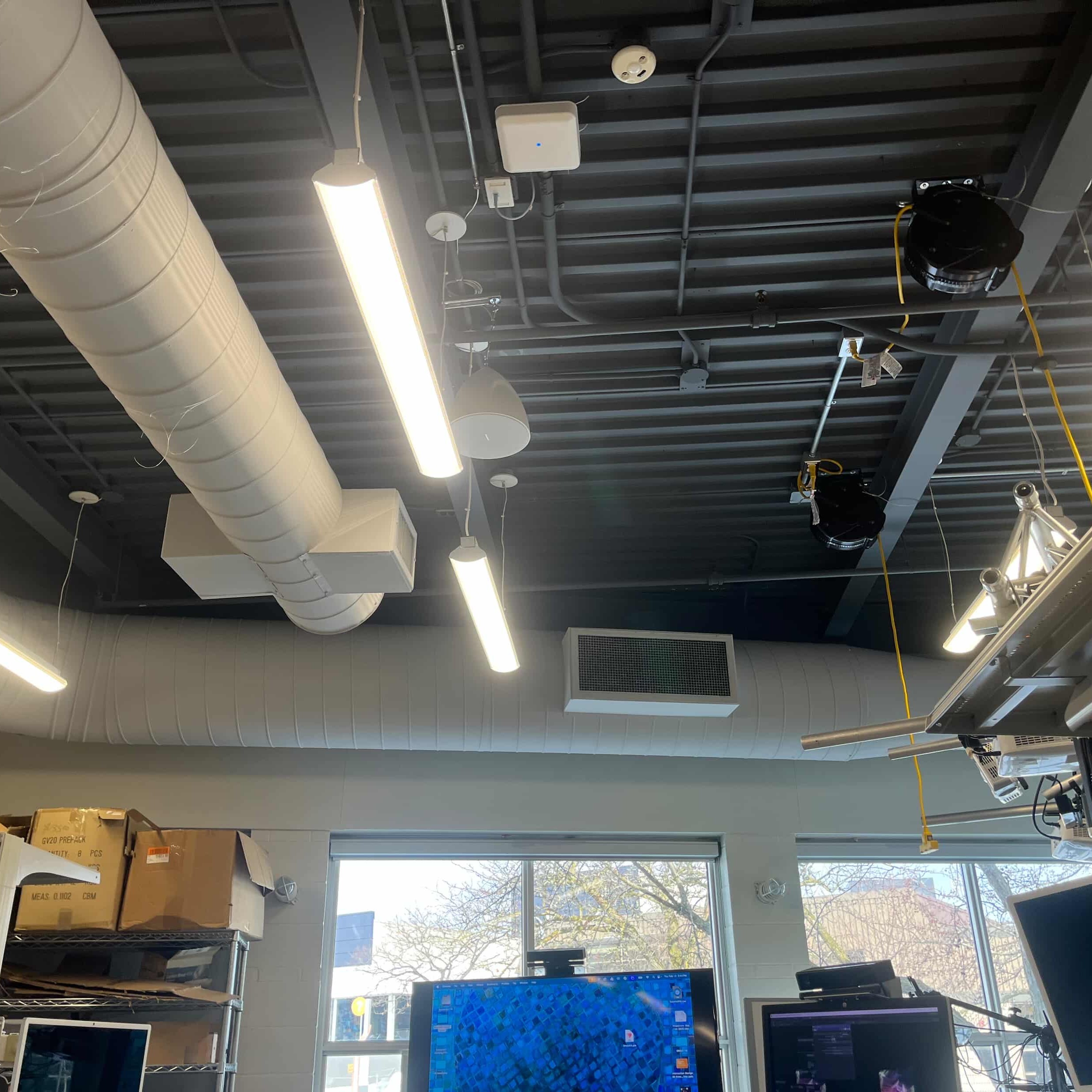 In Room AA1A, there's quite a bit of background noise from the vents running along the room's ceiling.