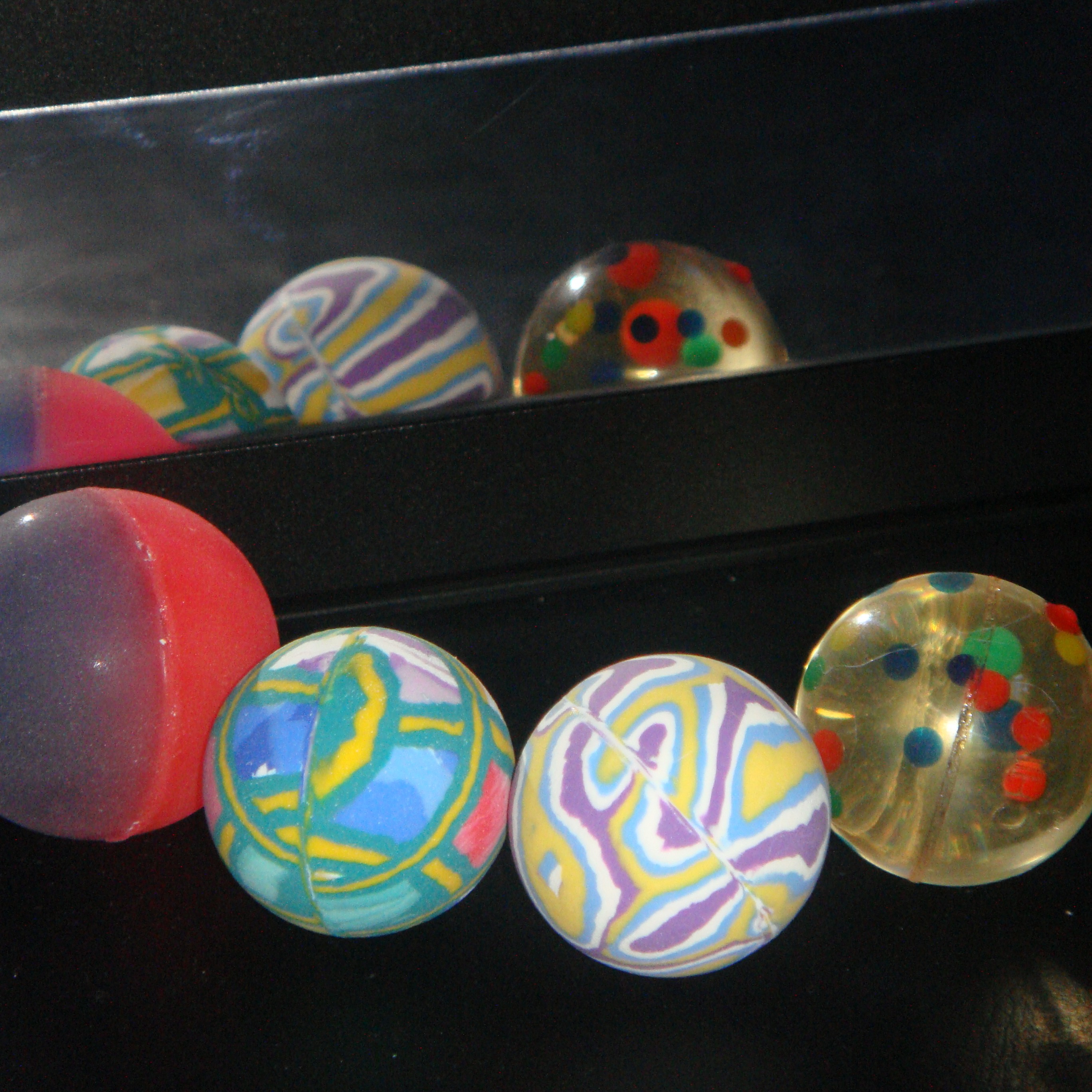 A collection of bouncy balls from capsule toy machines. All were gifted to me by my friends.