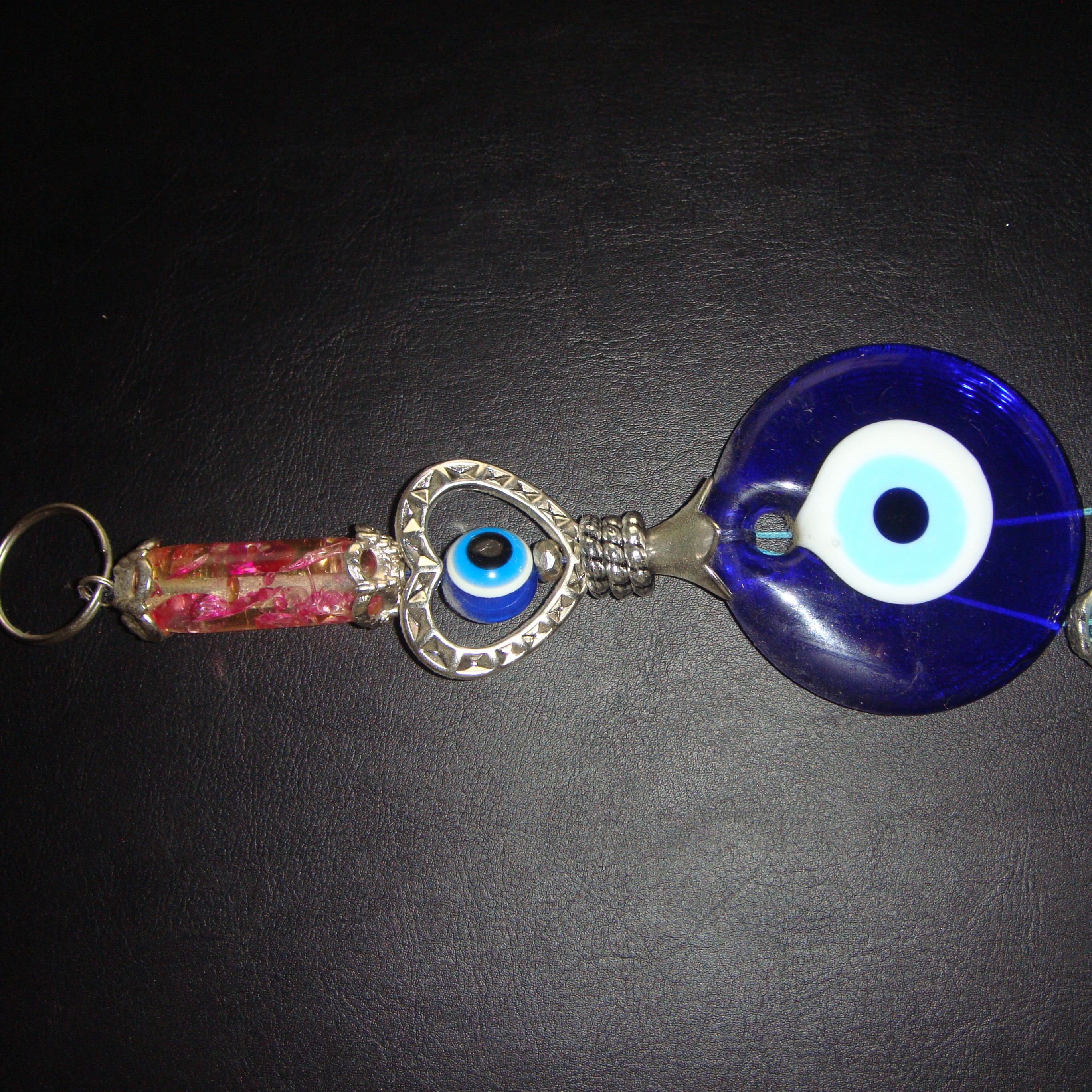 An evil eye ornament my mom has hanging on her and my dad's bedroom. It's said to protect from evil spirits.