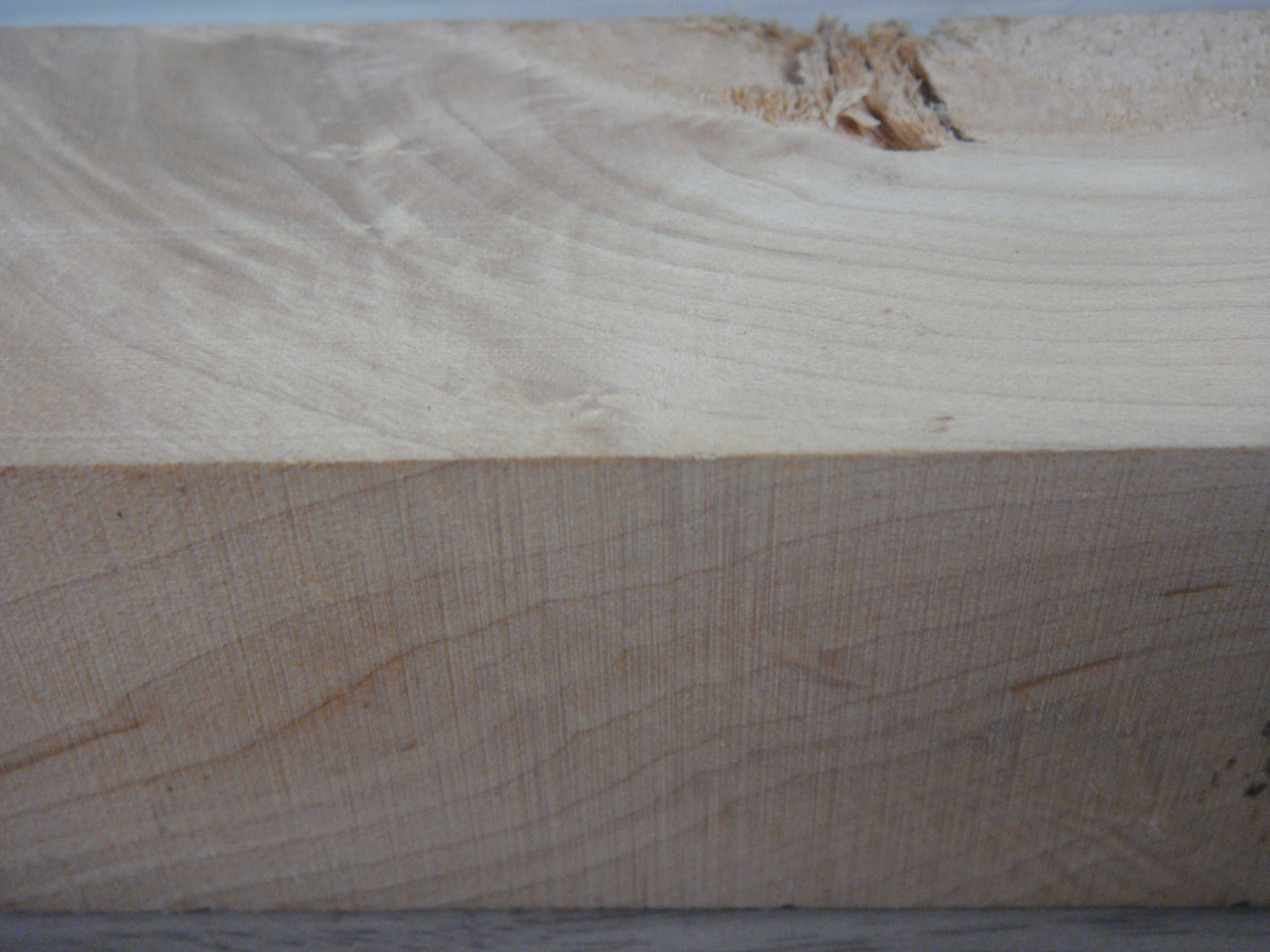 A block of wood I found in the collection of materials brought to Week 4's lecture. I've always loved the pattern of wood grain—it's almost hypnotizing. For example, the wood's pattern in this photo feels like it's pointing the viewer to the right! The feeling of wood is really unpleasant when the grain is exposed though.